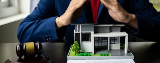 Consultation, contract agreement, lawyer focused on court hammer sitting on chair with client's indictment to settle home and land in court house auction concept: nonprofits sue los angeles