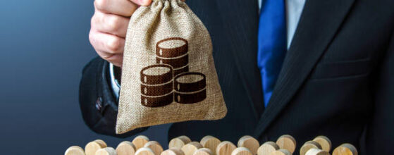 Businessman holds out a money bag to the crowd. Providing money, paying salaries and grants. Official. Staff maintenance. Compensation payments. Financial support. Tax collection.