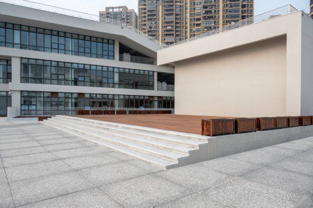 Podium Deck Construction - Modern buildings next to the empty slate Road