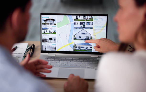 Couple Family Searching Real Estate Online On Laptop