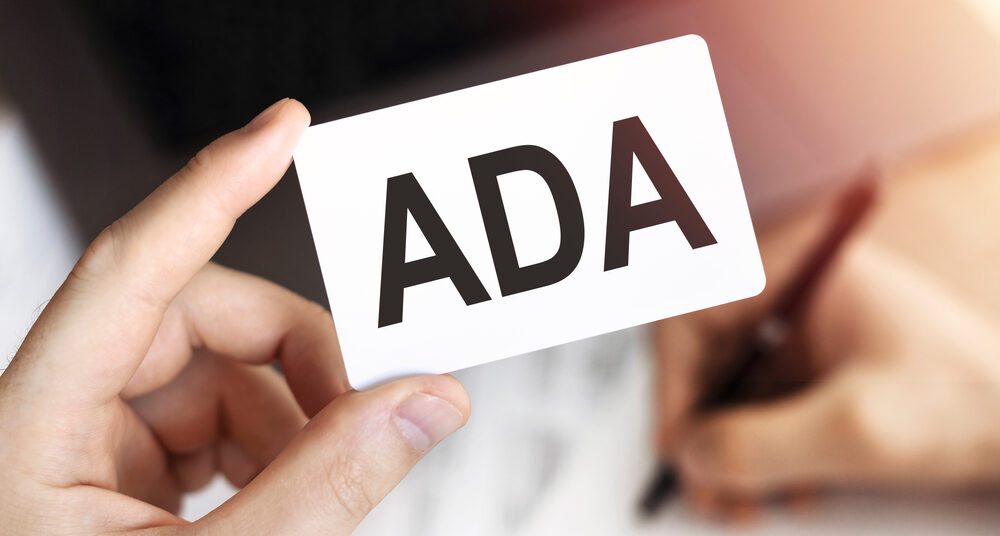 Business concept. Card with letters ADA - Americans with Disabilities Act.