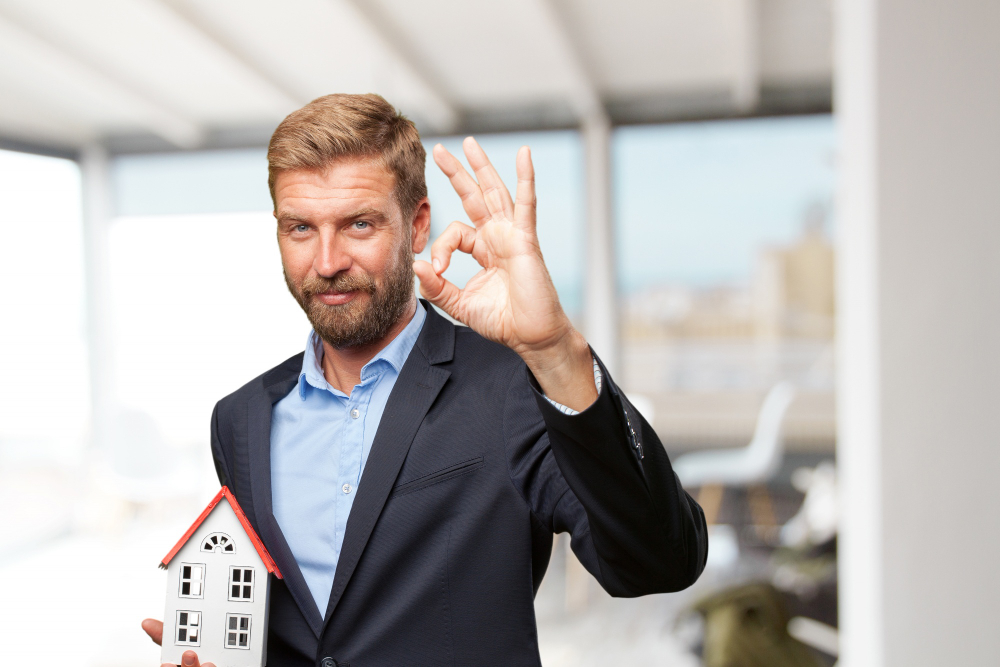 Blond businessman happy expression